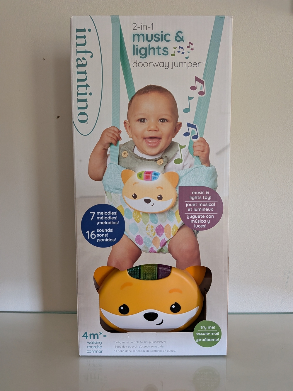 Infantino 2-in-1 Music & Lights Doorway Jumper - Teal/Orange
